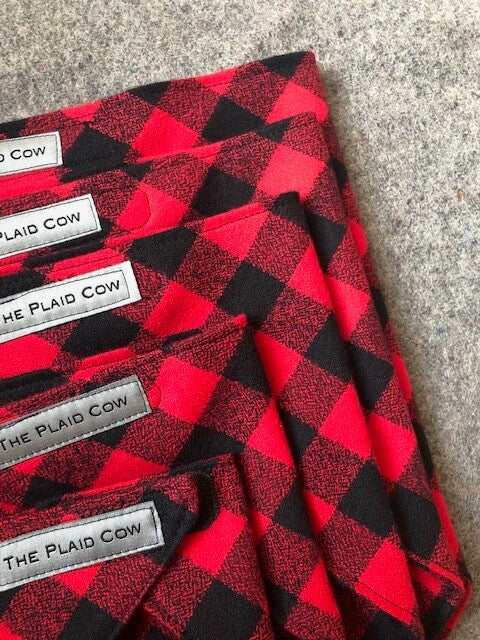 All sizes of The Plaid Cow Dog Bandana in red buffalo plaid