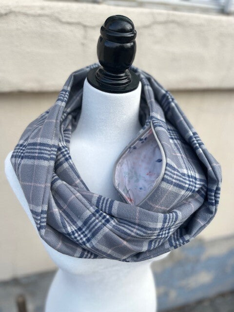 Hidden pocket infinity scarf with a light and dark grey  plaid pattern