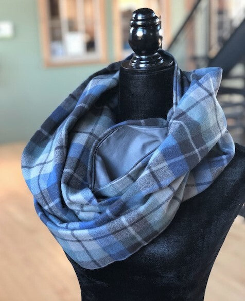 Hidden pocket infinity scarf with a blue and grey pattern