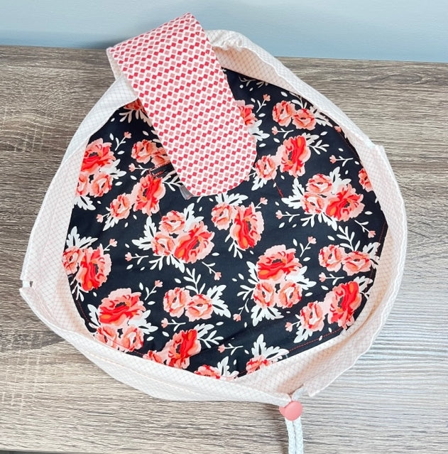 Red and pink florals on a black background inner cinch sac view